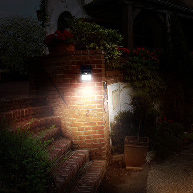 Solar-Powered Motion Sensor Wall Light for Outdoor Safety - Mega Cart